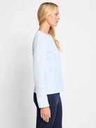 Light blue weave mix knit jacket with a rounded neckline and front zip.