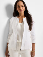 Off-white weave mix knit zip jacket. Collarless, long sleeves, dark front zipper, and two patch pockets.