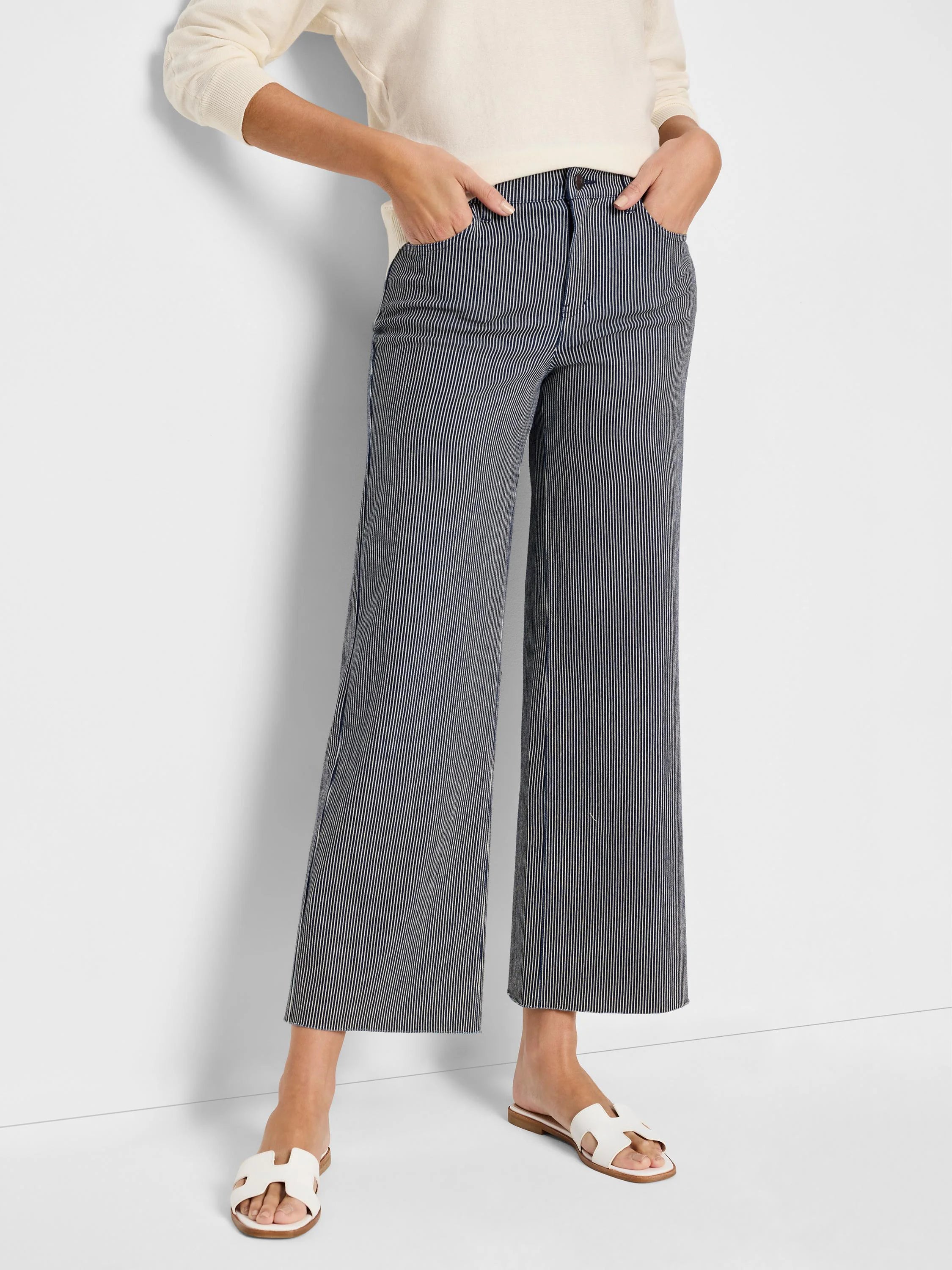 Wide-leg jeans; navy blue and white thin vertical stripes.  Cropped, frayed hem.