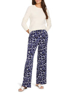 Wide-leg pants with navy blue and white pebble print.