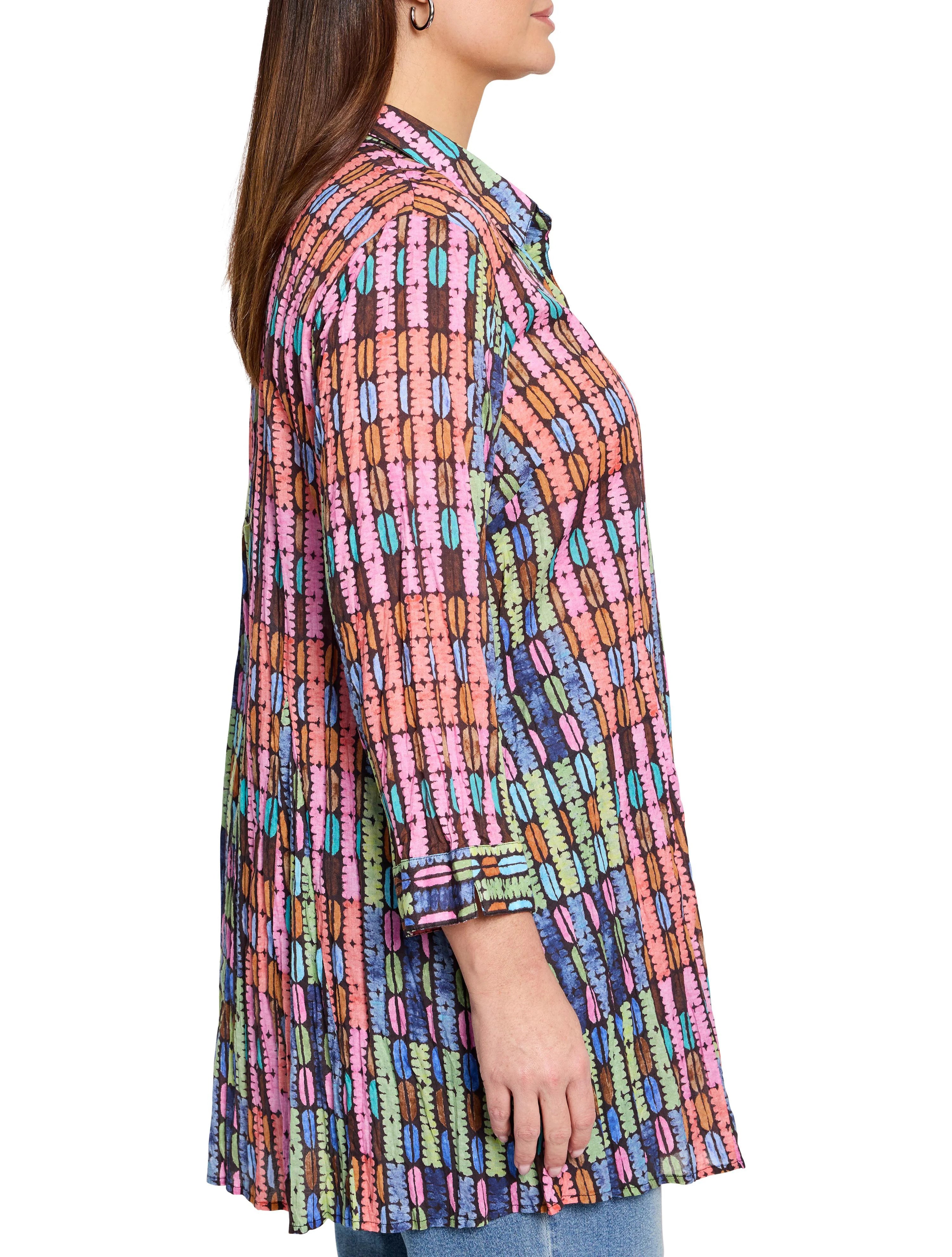 Multicolored long-sleeve shirt. Dark background with vertical stripes of pink, orange, teal, and green rounded shapes. ...