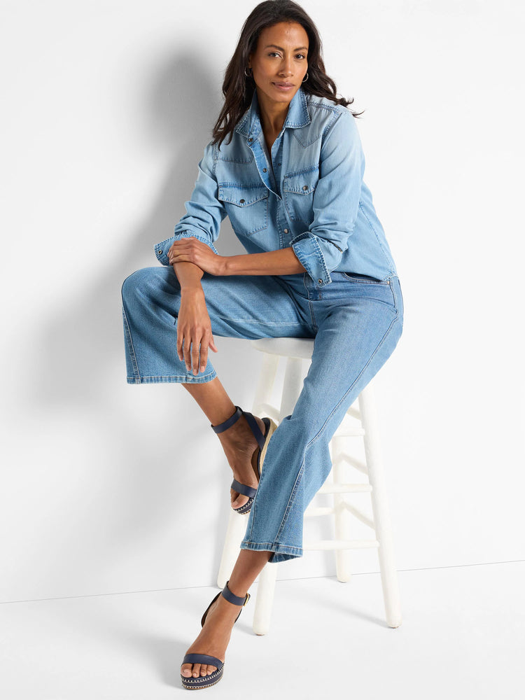 Light blue denim shirt, button-front, chest pockets.