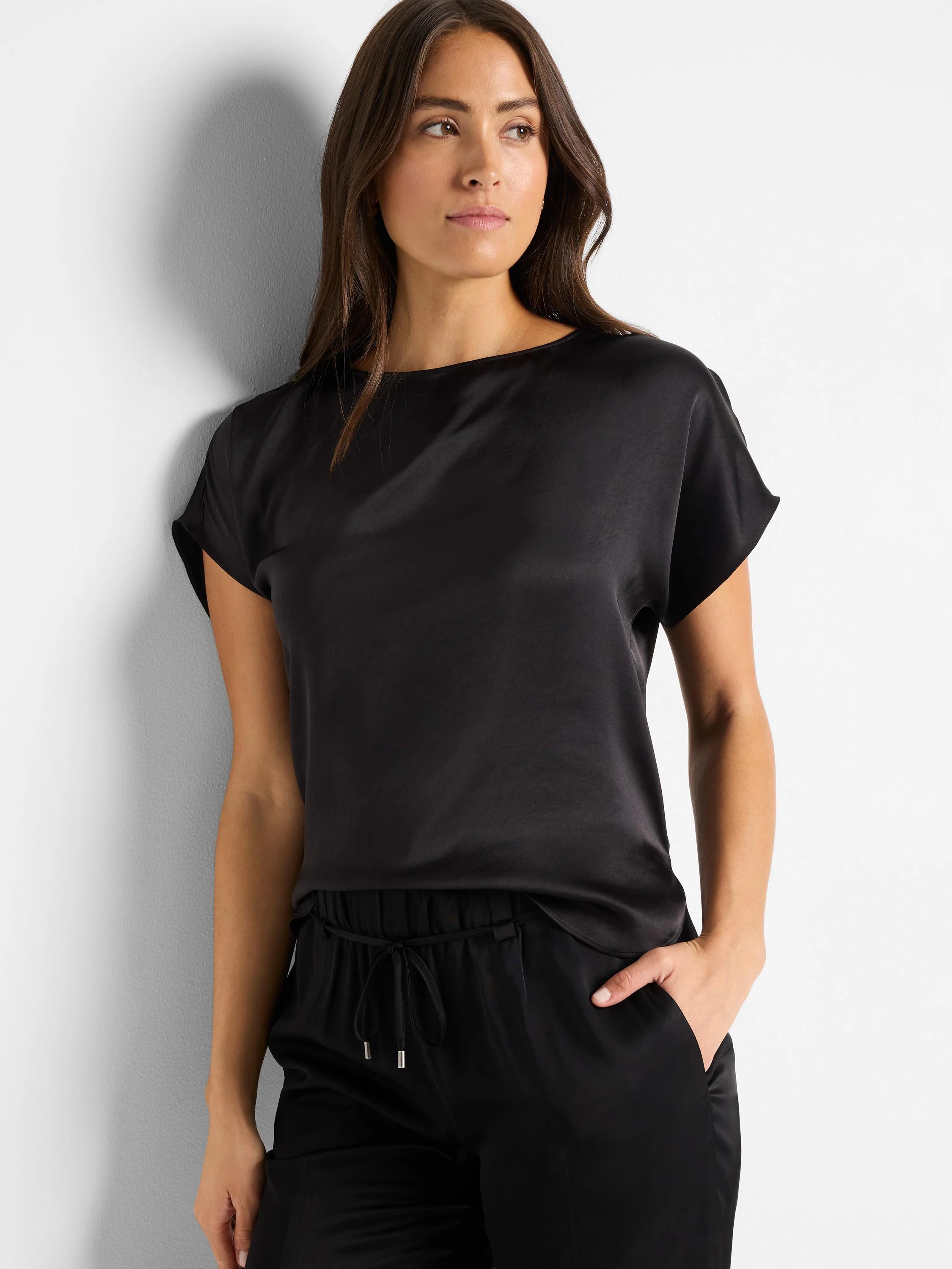 Black, short-sleeved woven top.  Boat neck.  Shiny satin-like texture.