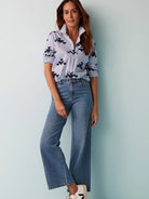 Here's alt text for the image, under 125 characters:
Woven shirt: Blue stripes, dark blue stamped pattern.  Long...