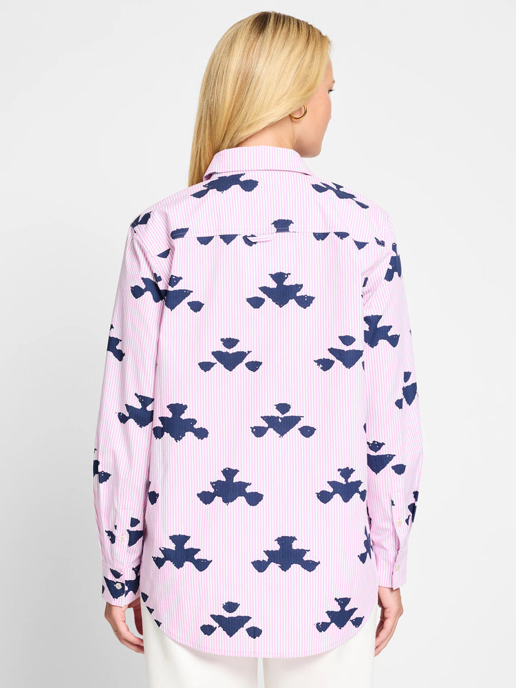 Pink & navy blue striped shirt. Features a repeating stamped pattern. Long sleeves, button front.