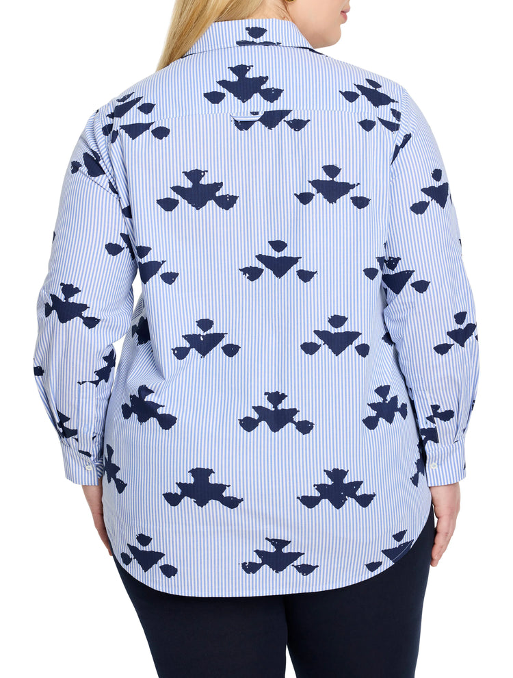 Blue and navy shirt. Vertical stripes. Navy stamped pattern resembling stylized flowers or clouds. Long sleeves, collared.