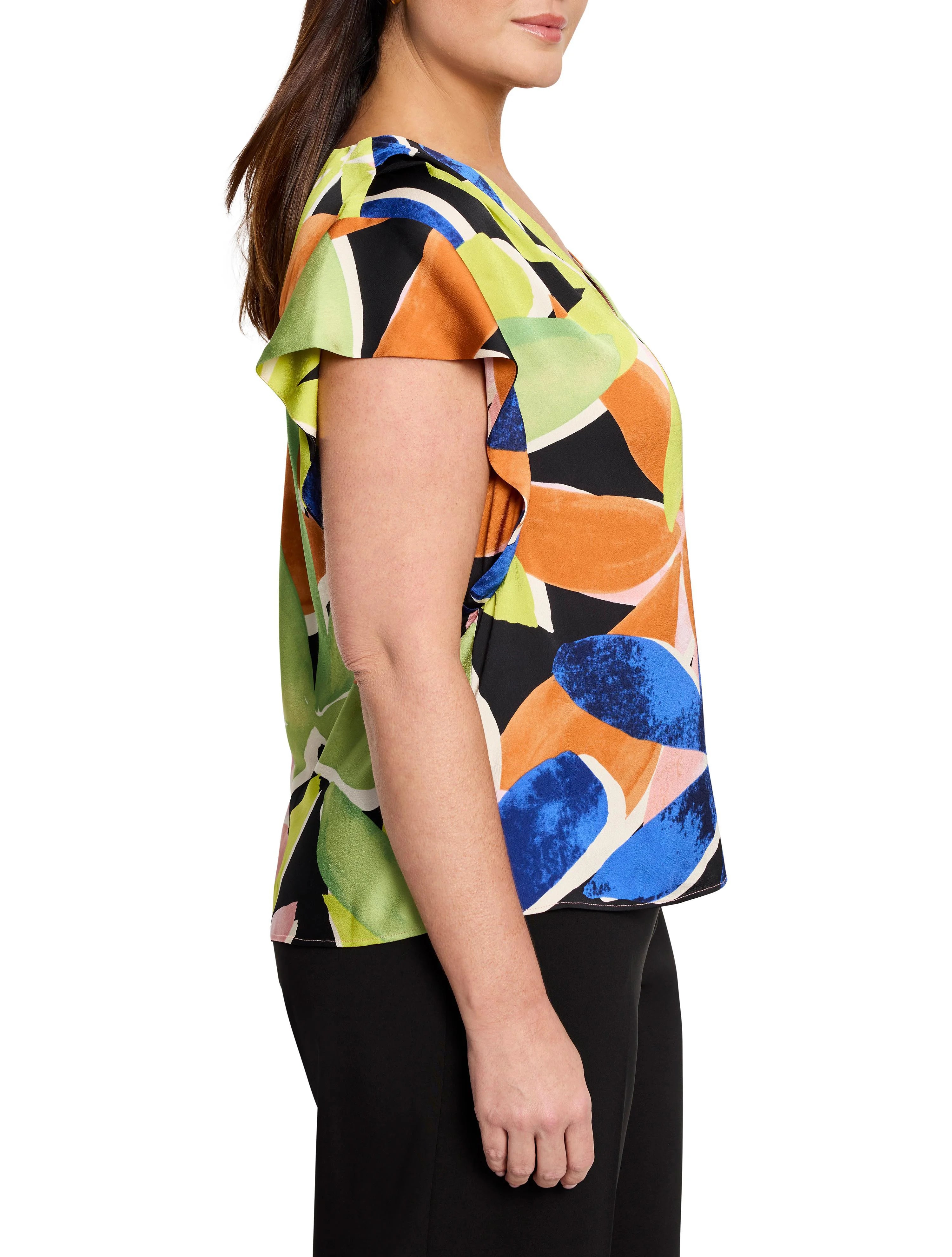 Black top with lime green, orange, and blue abstract print. Flutter sleeves.