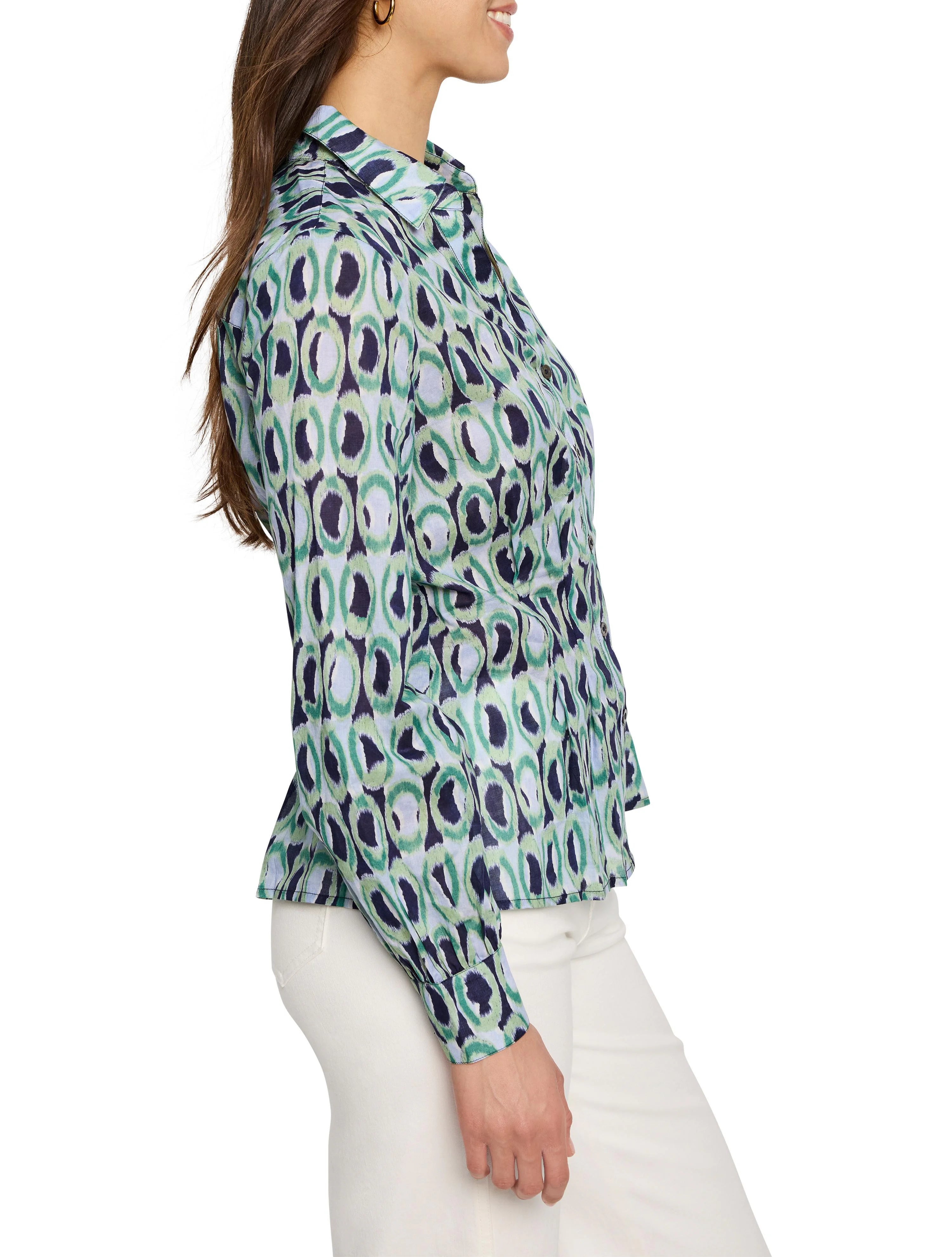 Long-sleeve button-down shirt; teal, green, and navy blue ring pattern on light blue background. Fitted waist.