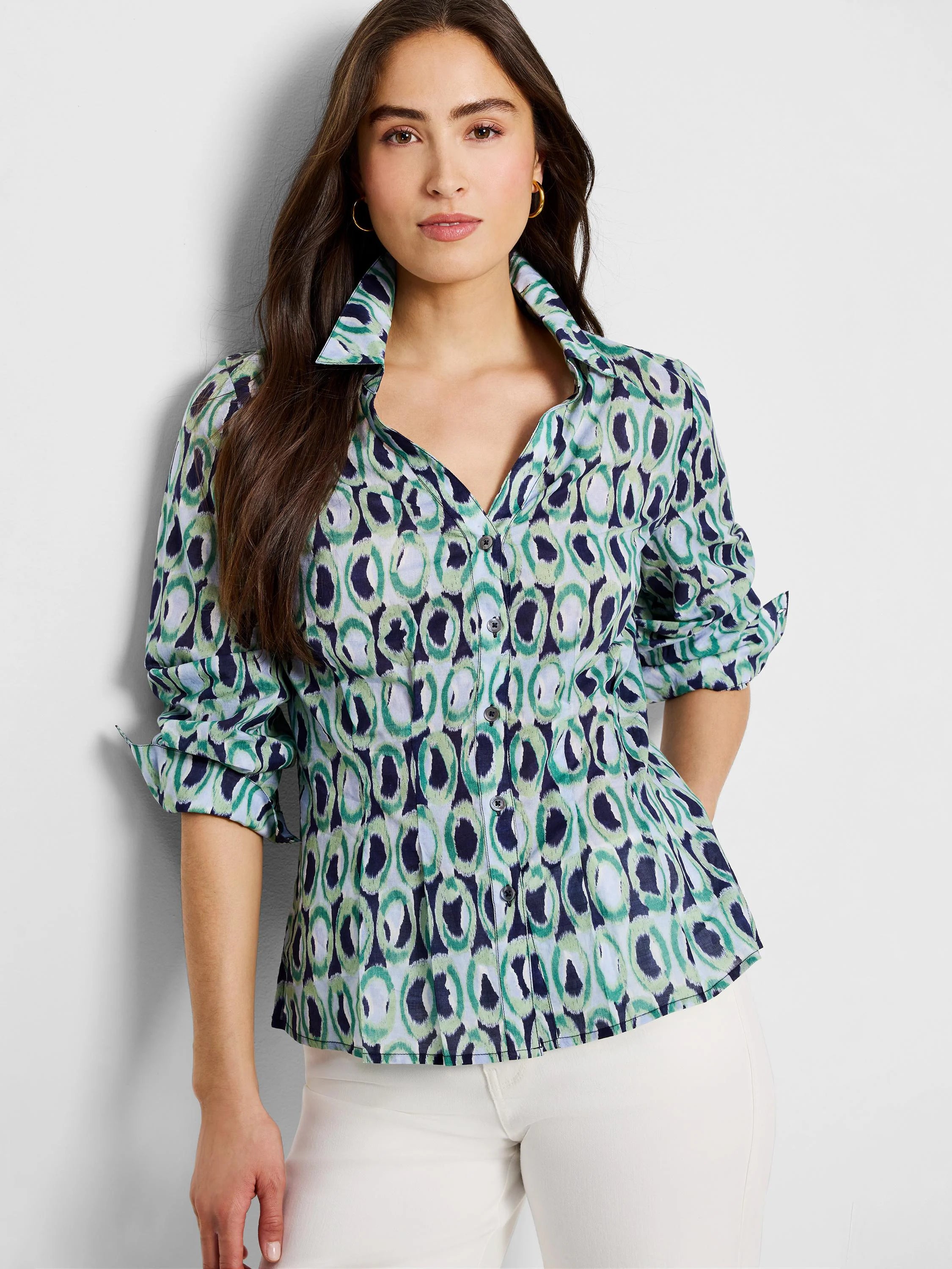 Green, blue, and white ring-patterned, collared, 3/4 sleeve button-down shirt.