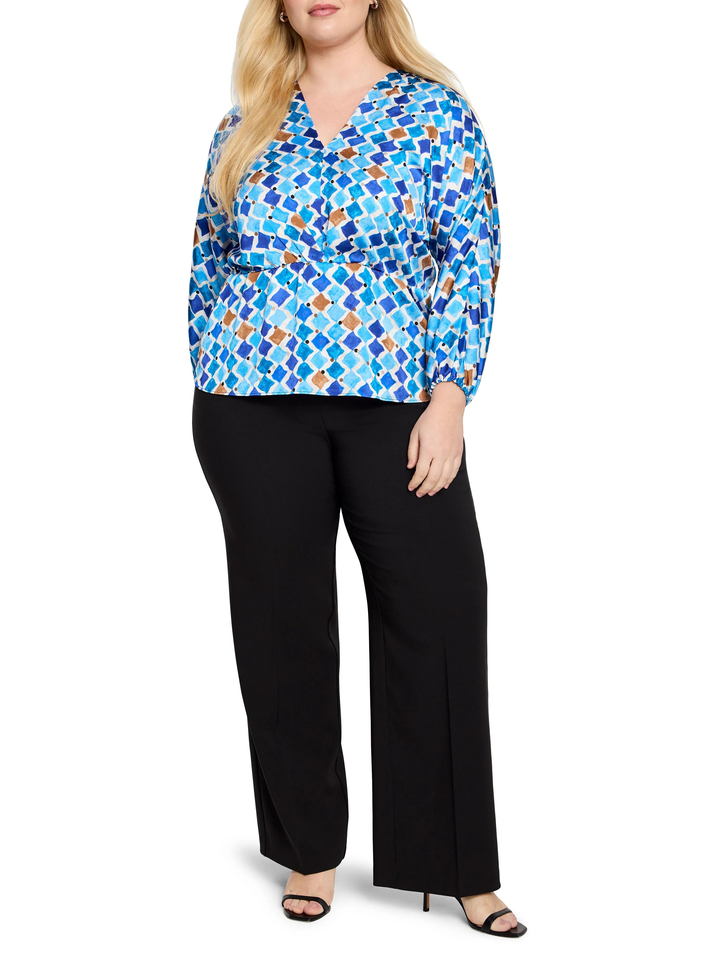 Blue, brown, and white mosaic print blouse with V-neck and long sleeves.  The blouse has a fitted waist.
