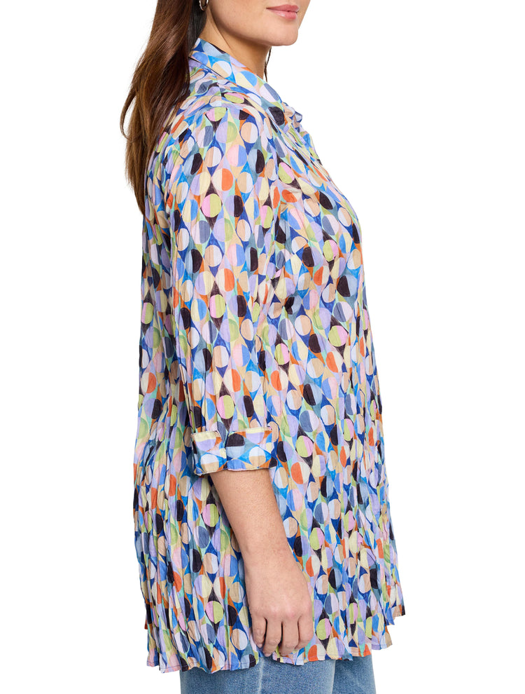 Crinkled, 3/4 sleeve shirt with multicolored geometric pattern in blues, pinks, oranges, and greens. Collared.