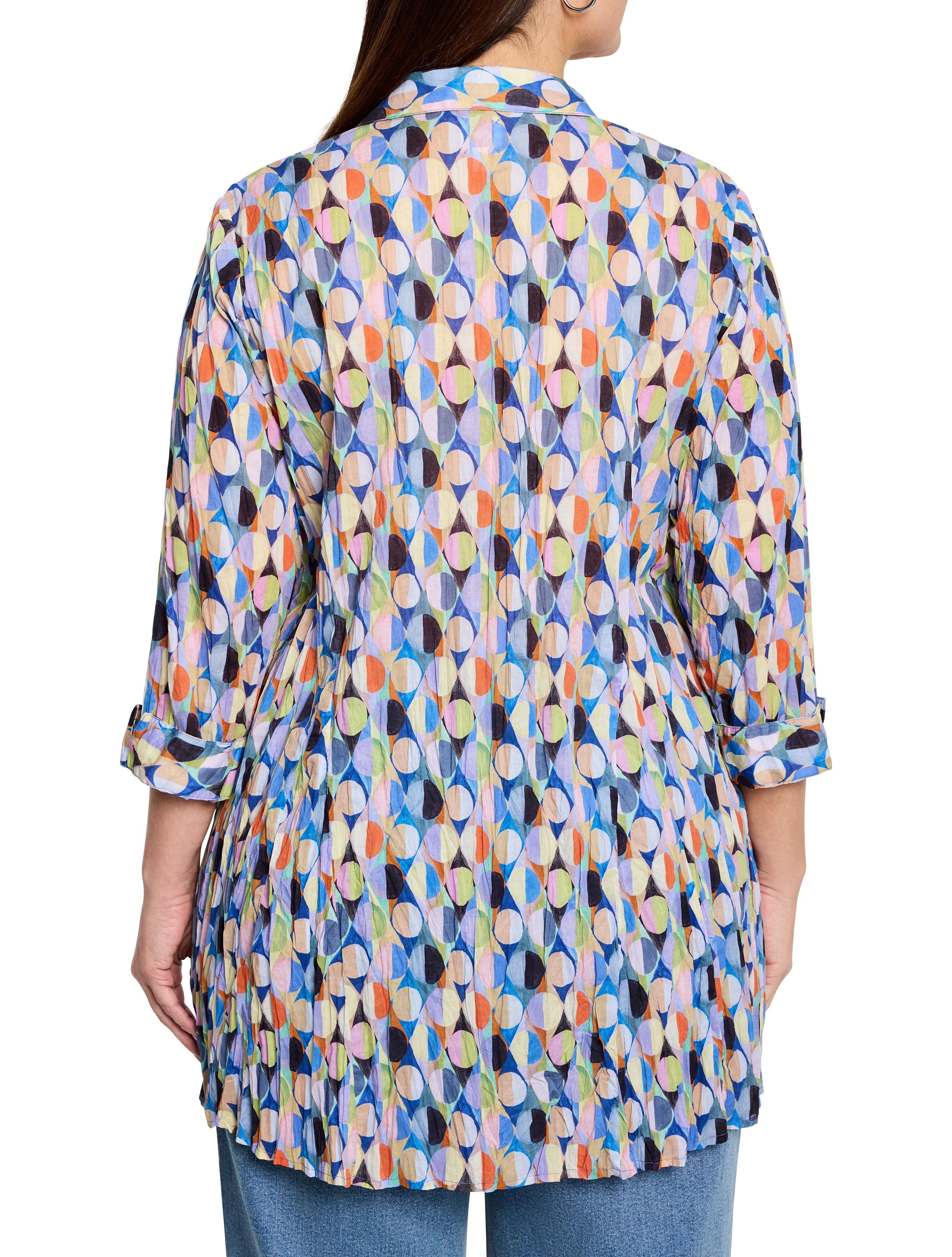 Crinkled, multicolored shirt with geometric print.  Blues, oranges, pinks, greens, and beige.  Three-quarter sleeves,...