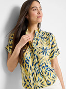 Yellow woven shirt with blue abstract print. Short sleeves, button placket.  Cinched waist.