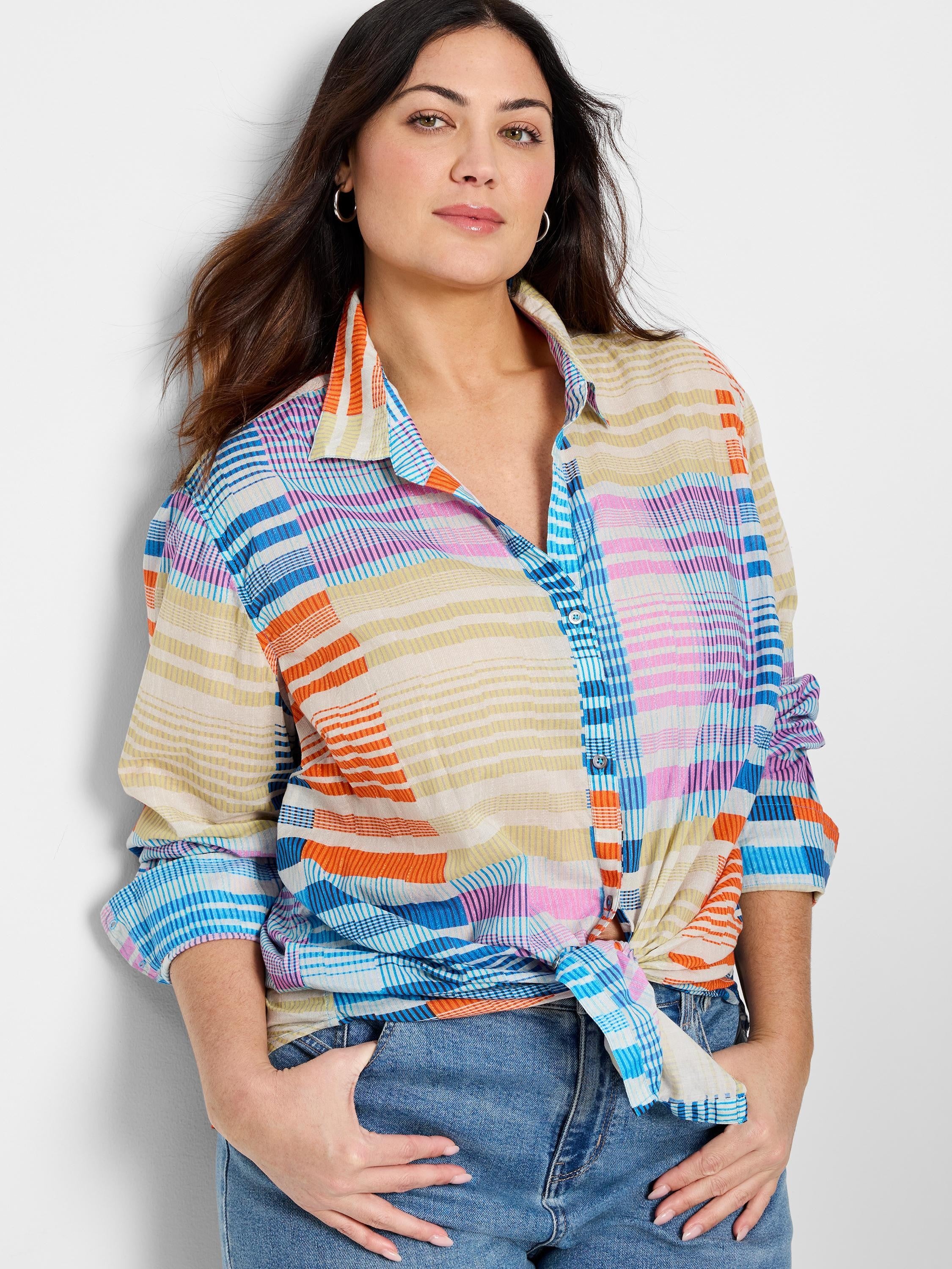 Cotton shirt; multicolored plaid pattern in orange, blue, pink, and beige.  Long sleeves, button-front.