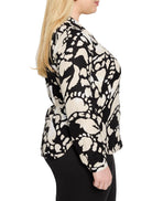 Black shirt with beige abstract print, long sleeves.