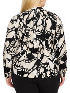 Black shirt with beige abstract floral pattern, long sleeves, and a back drawstring waist.