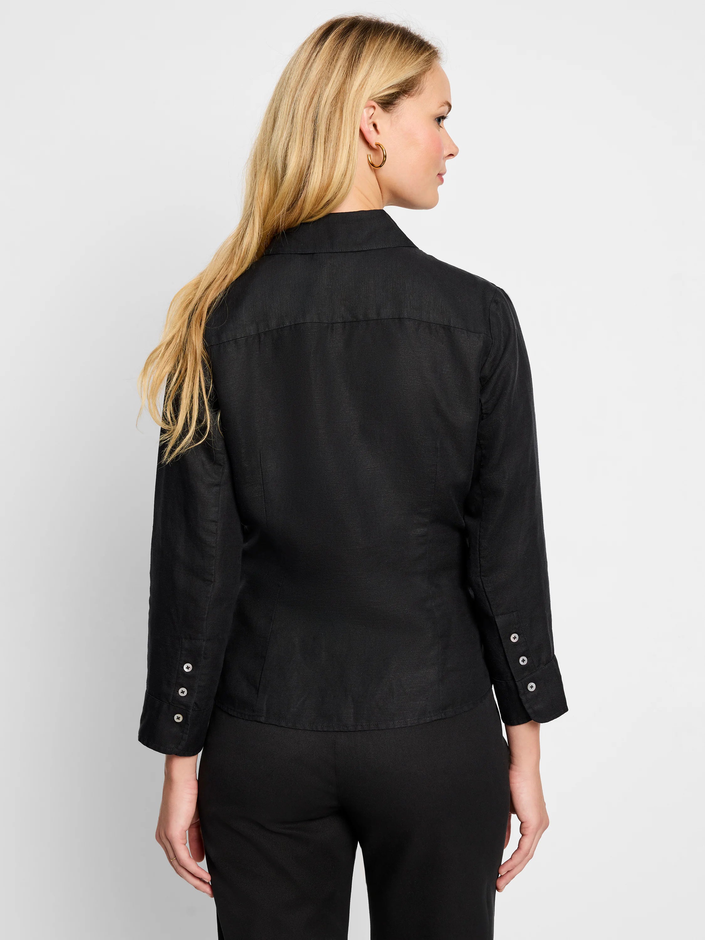 Black linen tie-front shirt, long sleeves, button cuffs.  Rear view.