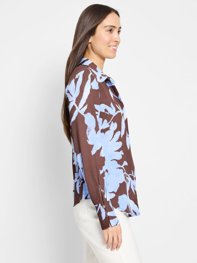 Brown long-sleeve shirt with light blue abstract floral print. Collared, button-front.