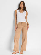 Wide-leg pants; light brown, featuring vertical seams.