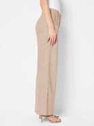 Beige linen-cotton wide-leg pants;  textured fabric. Shown on a model.