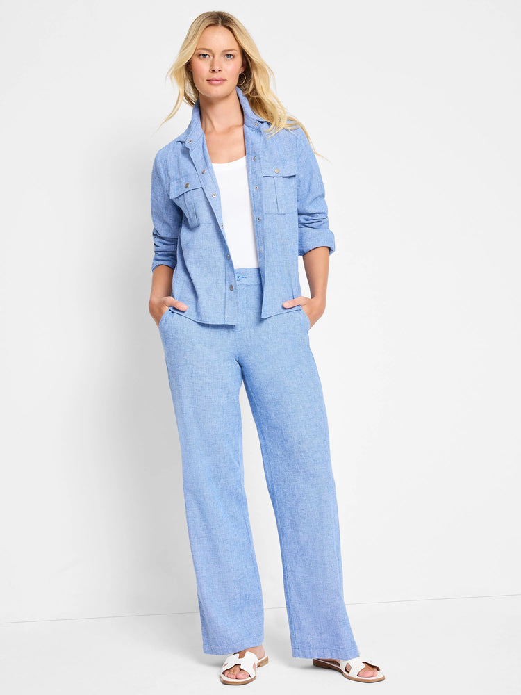 Light blue linen-cotton wide-leg pants; model wears them with a matching light blue shirt.