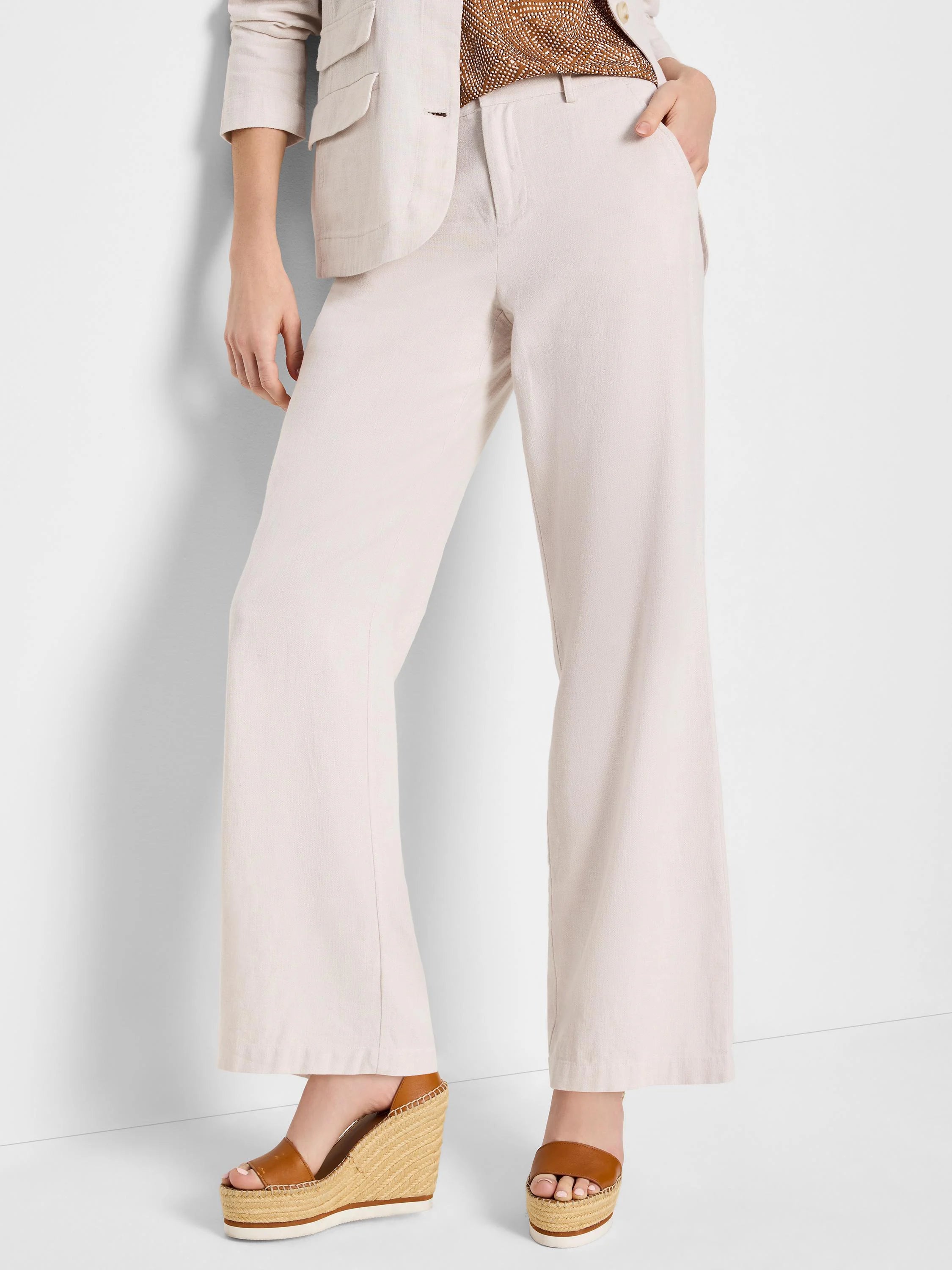 Off-white wide-leg linen-cotton pants shown on a model.