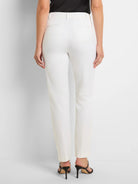 Rear view of white straight pants with belt loops and two horizontal back welt pockets.