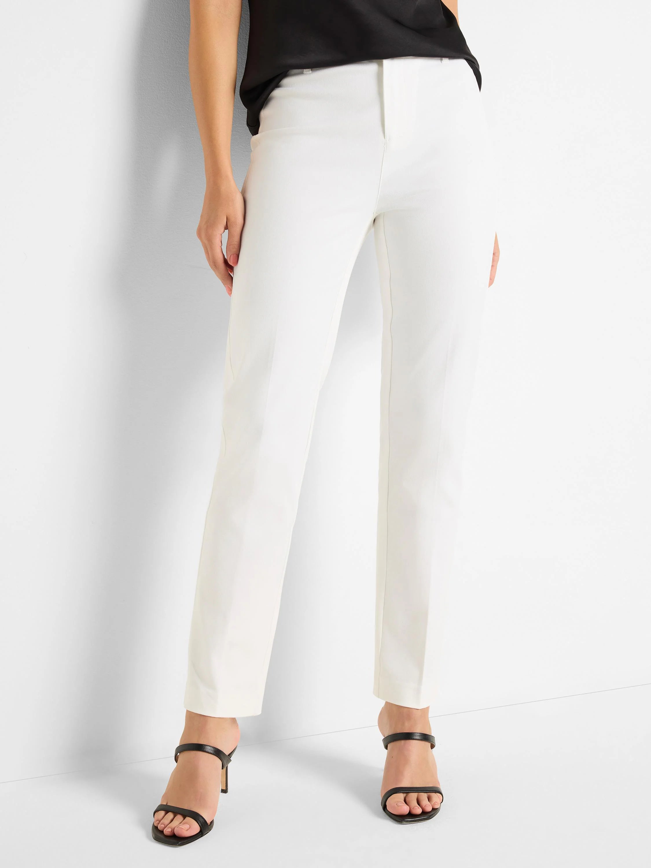 White flat-front straight pants on a model.