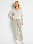 Light taupe straight ankle jeans with a 5-pocket design.
