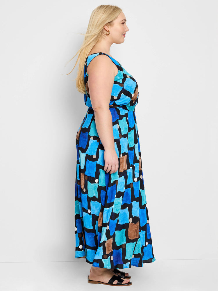 Sleeveless maxi dress; blue, teal, brown, & white abstract print on black background.