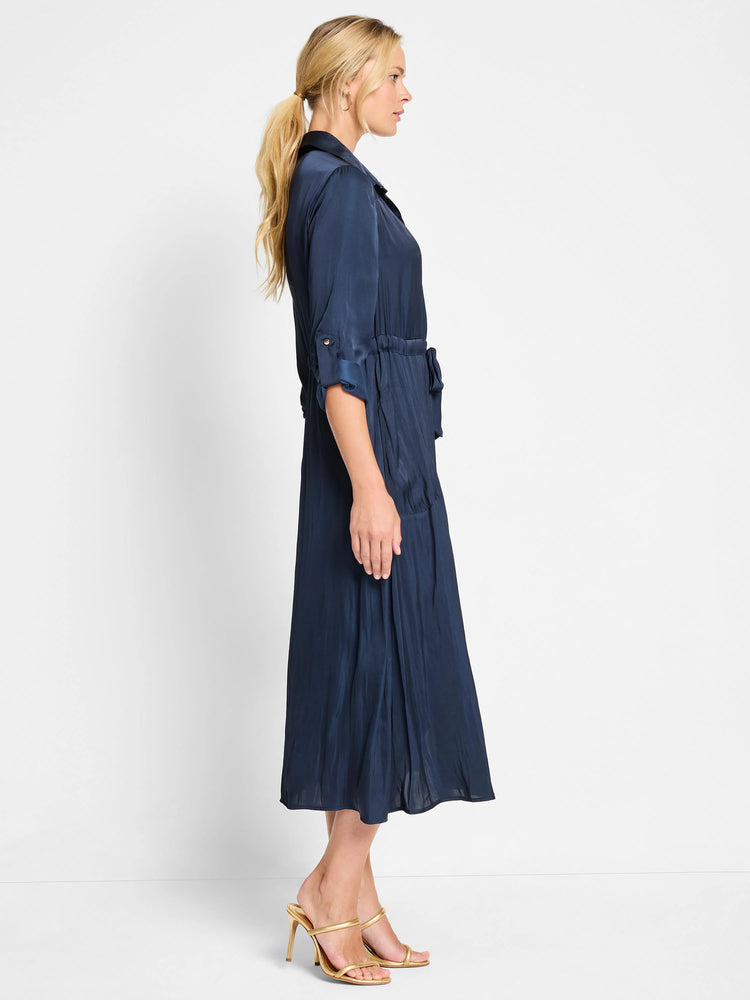 Navy blue midi dress, collared, belted waist, 3/4 sleeves. Crinkled texture.