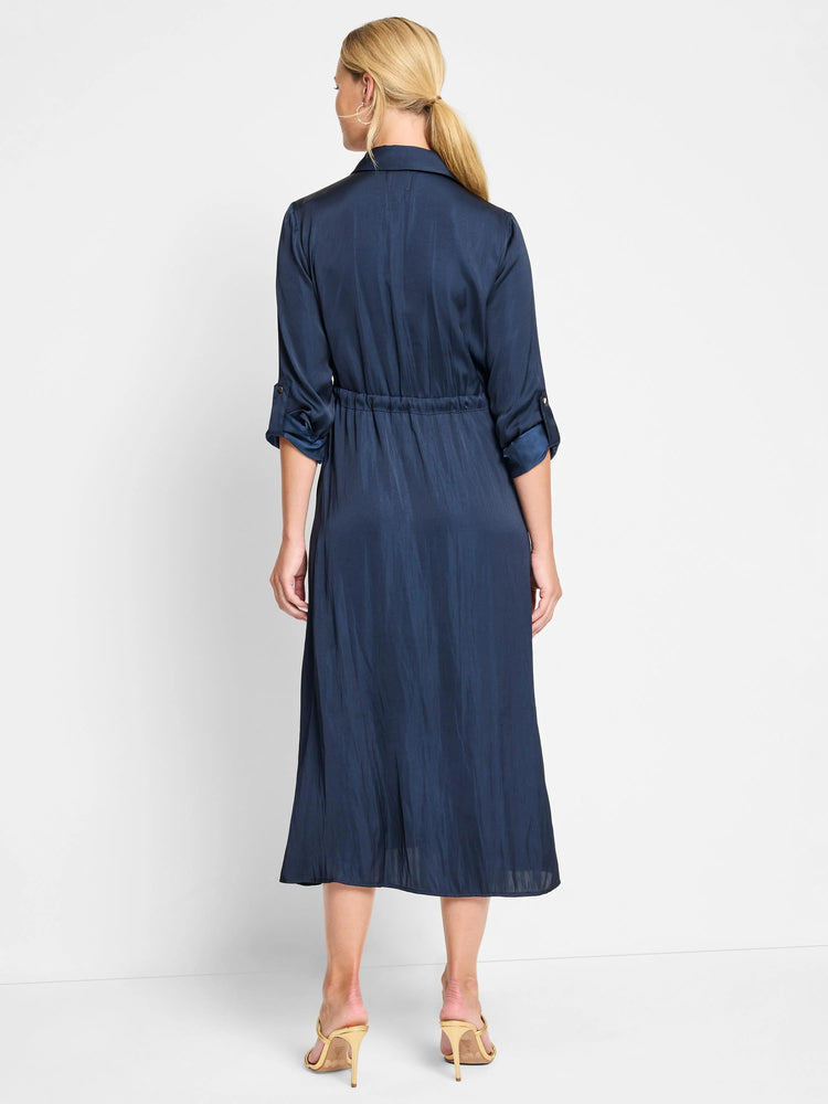 Navy blue midi dress, collared, long sleeves, cinched waist. Crinkled texture.