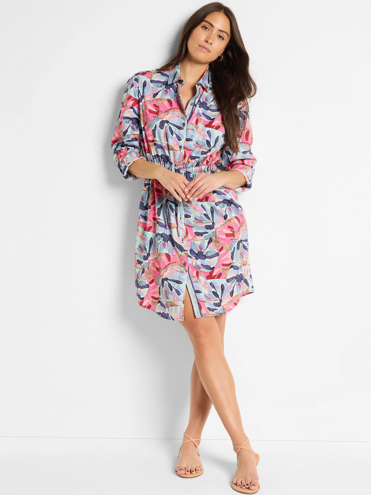 Pink, blue, and beige floral shirt dress with a drawstring waist and a center front slit. Long sleeves, knee-length.