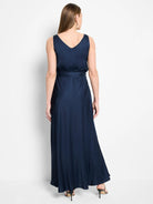 Navy blue maxi dress, sleeveless, V-neck, belted waist, A-line skirt.