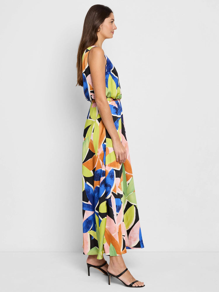 Sleeveless maxi dress. Black background with large abstract floral print in blue, green, orange, and pink.