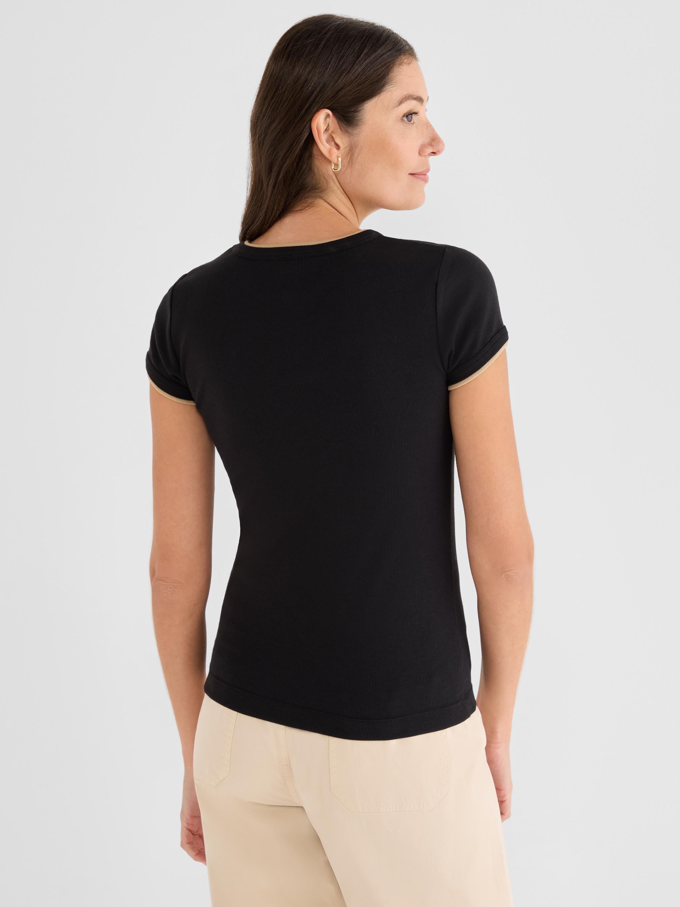 Fitted black ribbed t-shirt featuring short sleeves and subtle beige contrast ringer trim.