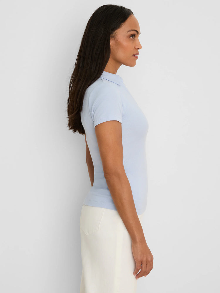 Light blue ribbed short sleeve polo. Fitted with a collar.