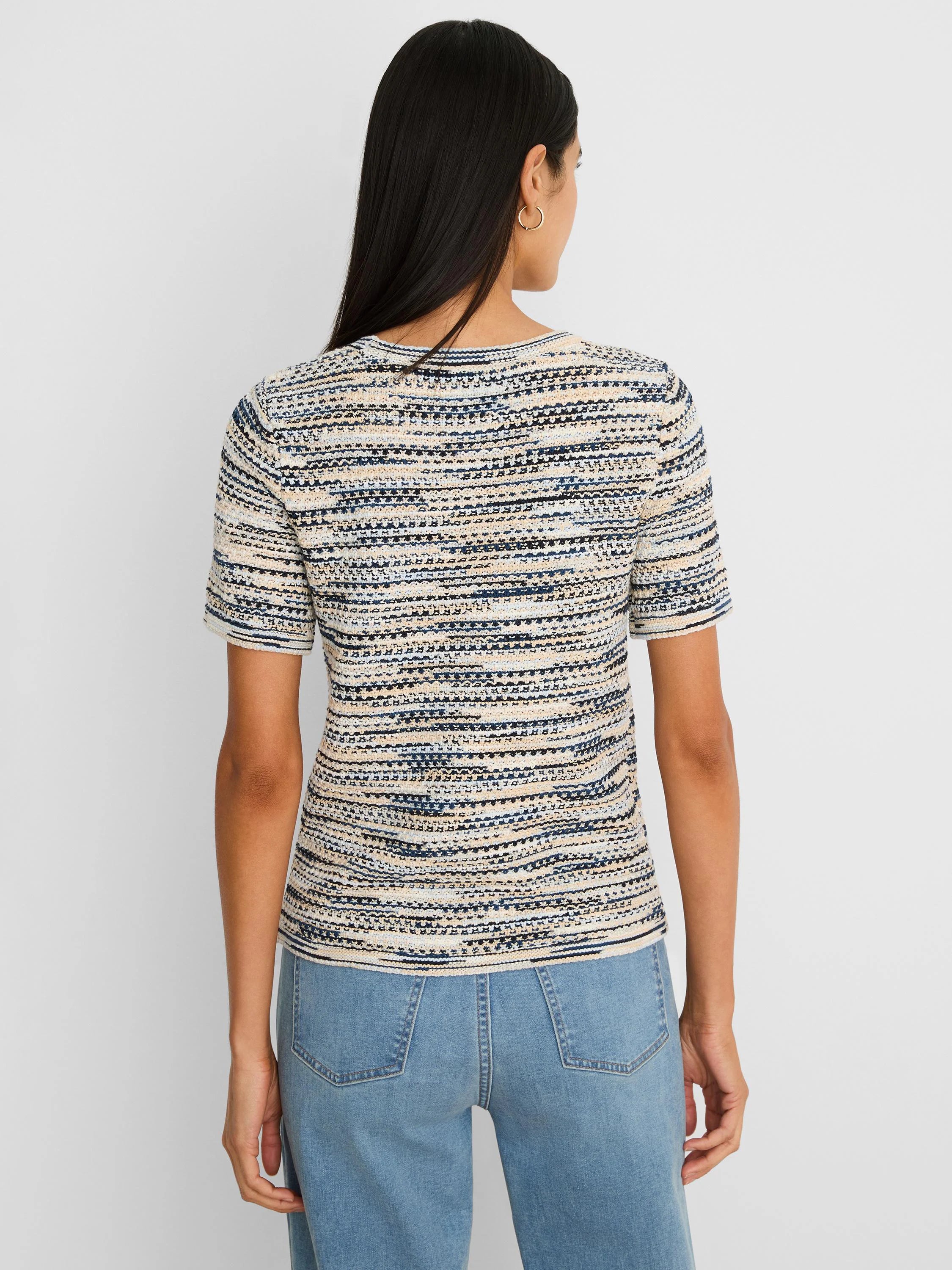 Short-sleeve sweater tee with cream, navy, and light blue spacedye tuck stitch in a horizontal stripe pattern.
