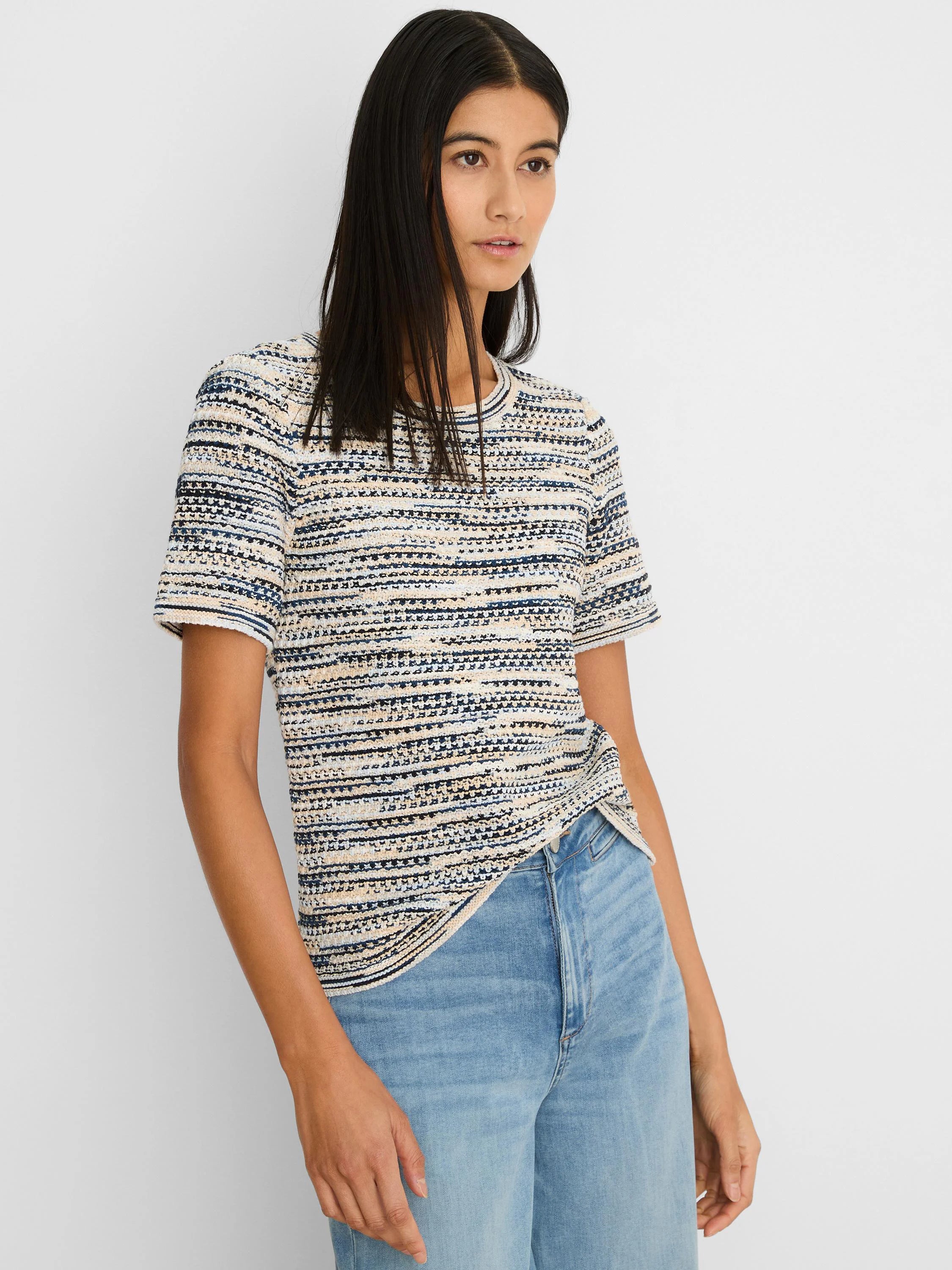 Spacedye knit tee: horizontal textured stripes in cream, navy, and black. Short sleeves, crew neck.