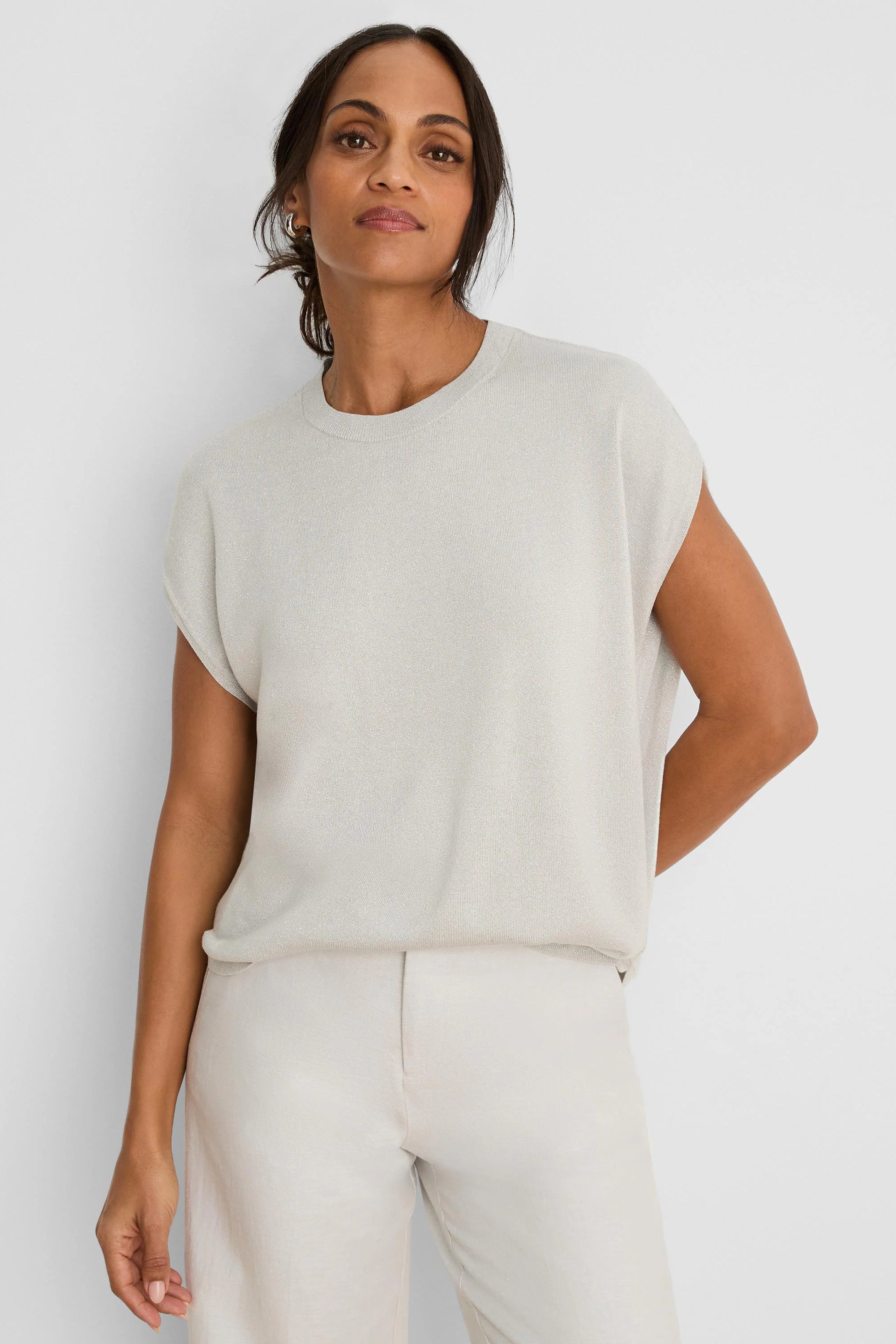 Pale greige shimmer sweater. Loose cocoon fit, round neck, short wide sleeves.