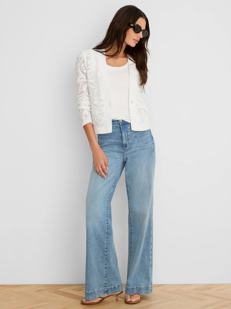 White, slightly cropped open-front jacket with an all-over floral lace pattern and 3/4 length sleeves.