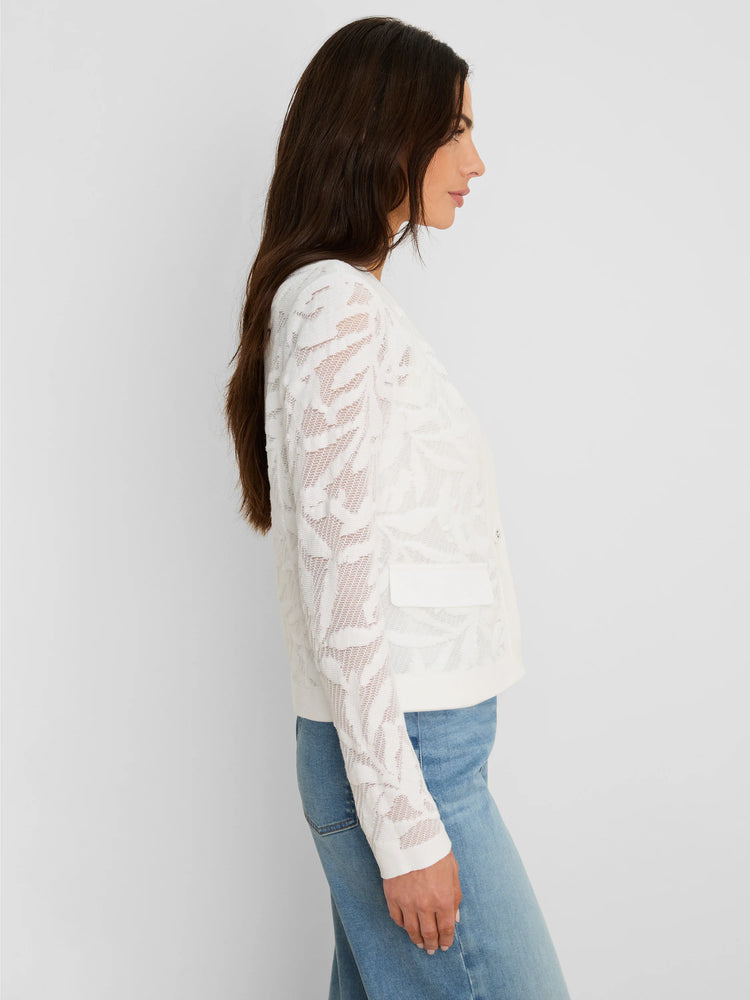 White lace jacket with an all-over leaf pattern, long sleeves, and two front flap pockets.