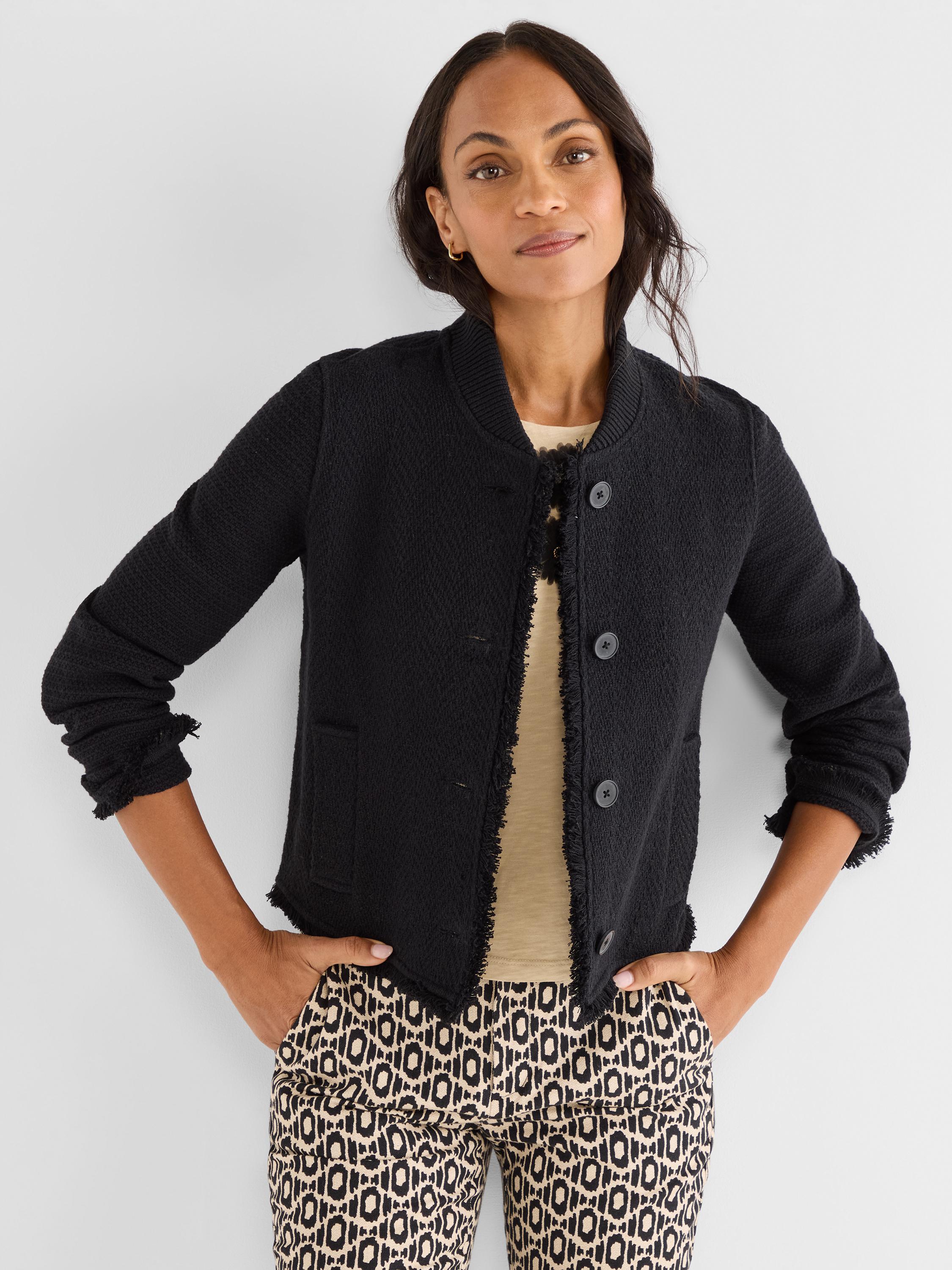Black relaxed fit textured jacket featuring a ribbed collar, button closure, and frayed trim details.