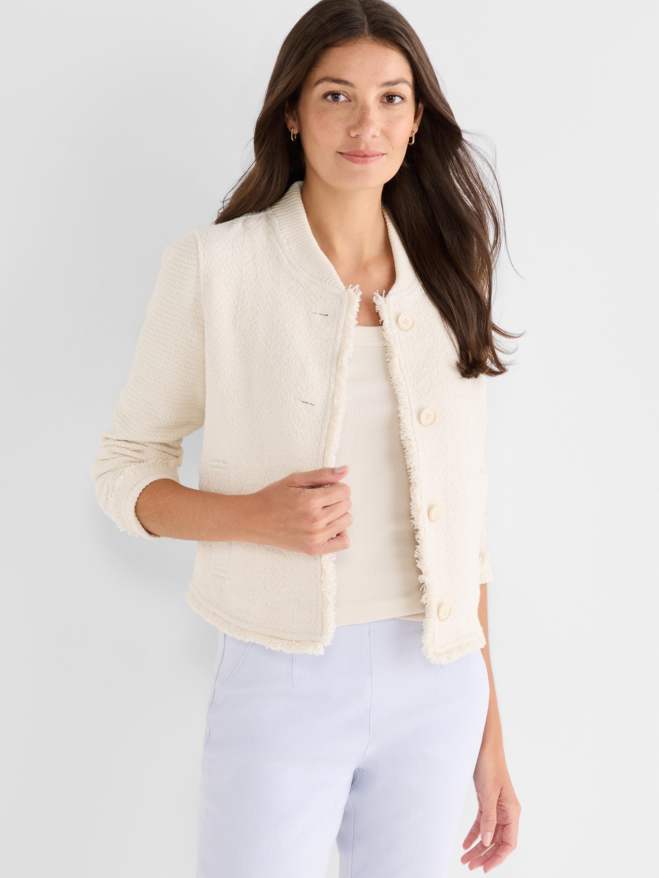 Cropped cream textured knit jacket featuring a collarless neckline, three-quarter sleeves, and frayed edge details.