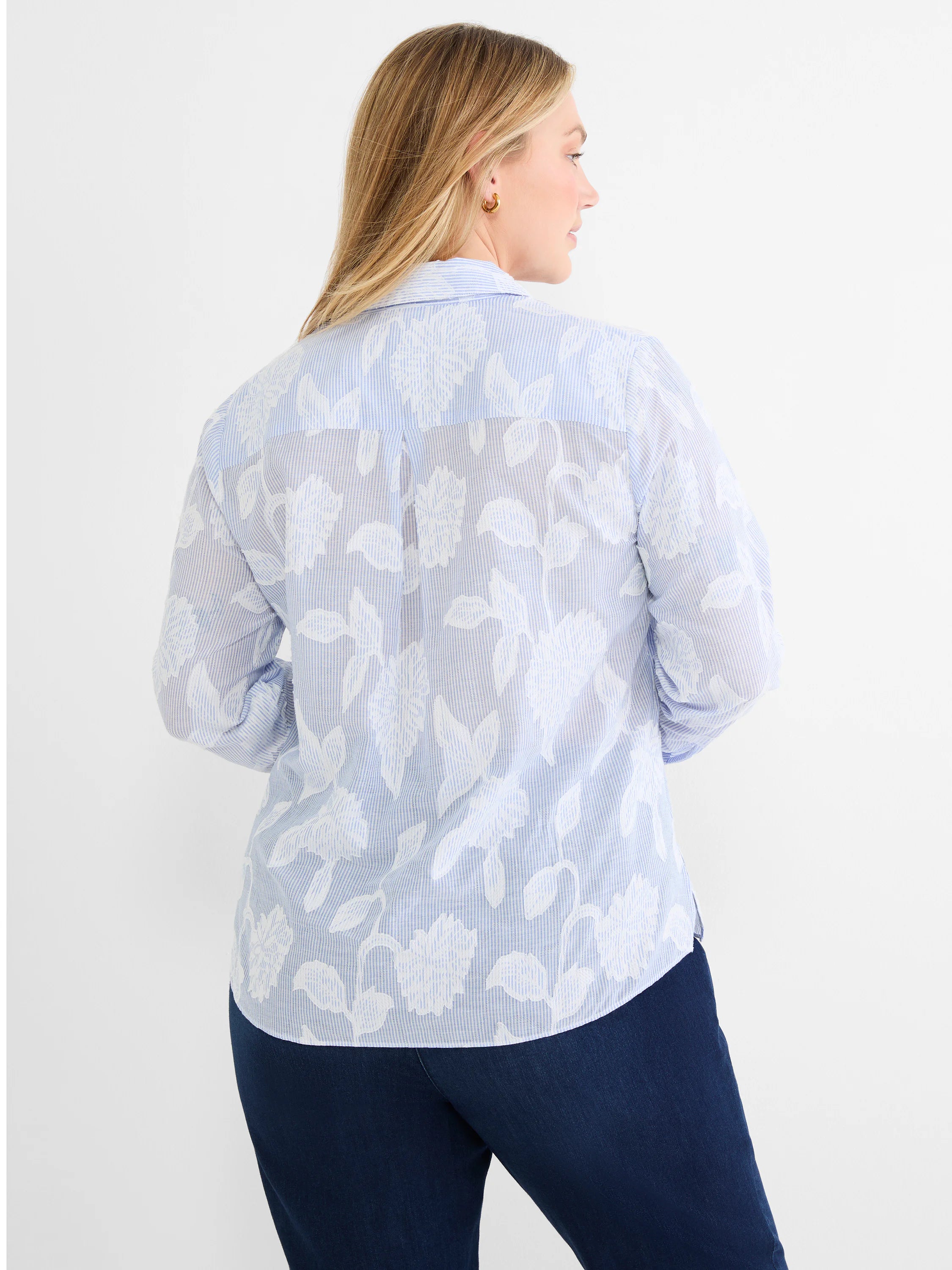 Light blue and white striped top with a raised white floral jacquard pattern.
