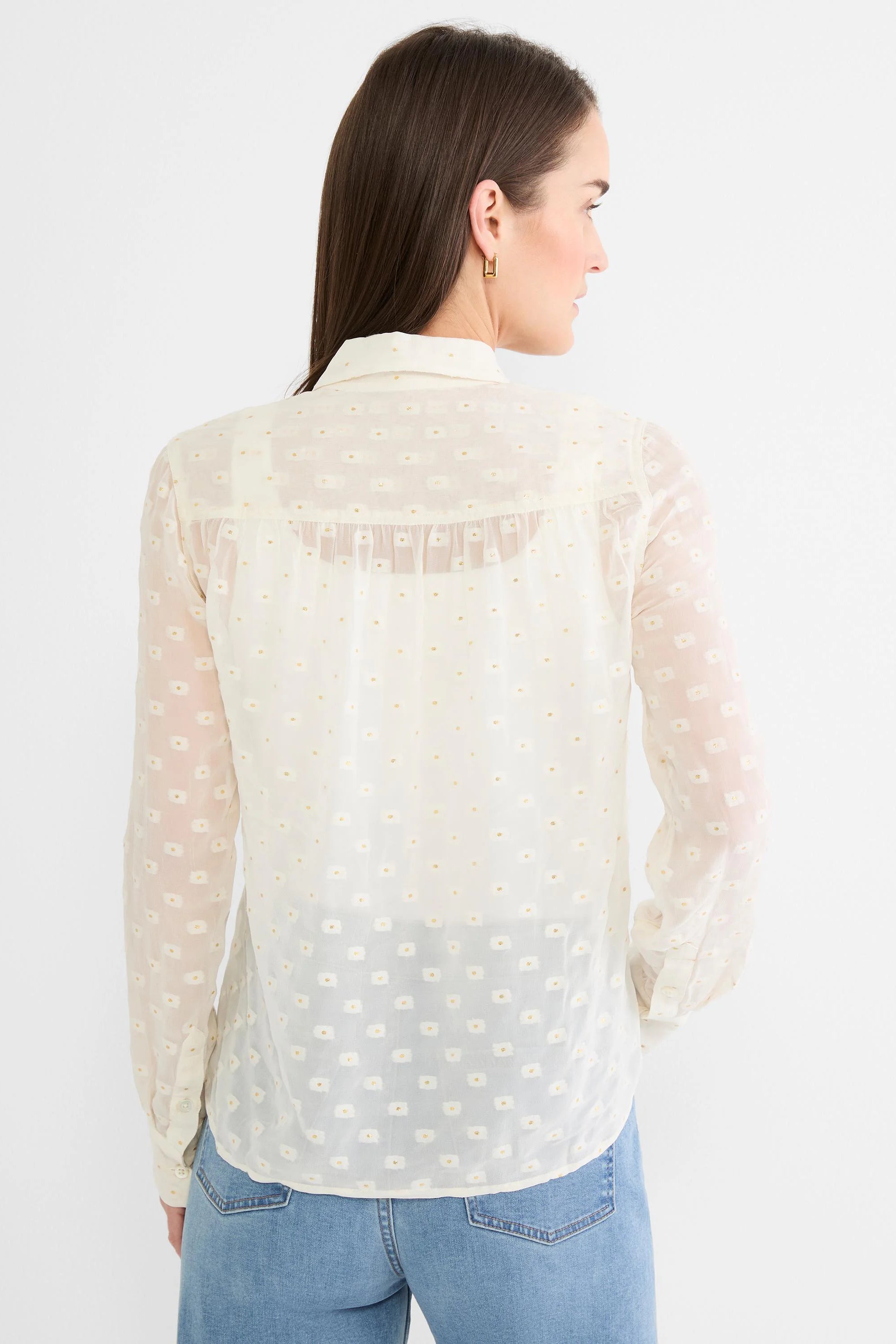 Off-white sheer collared long-sleeve shirt with woven square dots and scattered gold flecks.