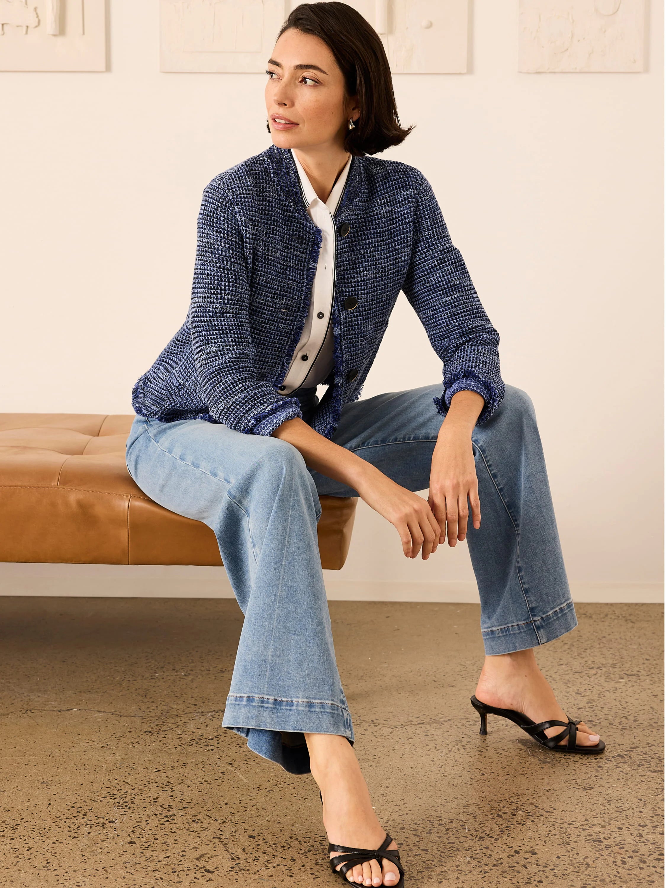 Light blue, wide-leg, high-rise jeans, cropped with cuffed hems.