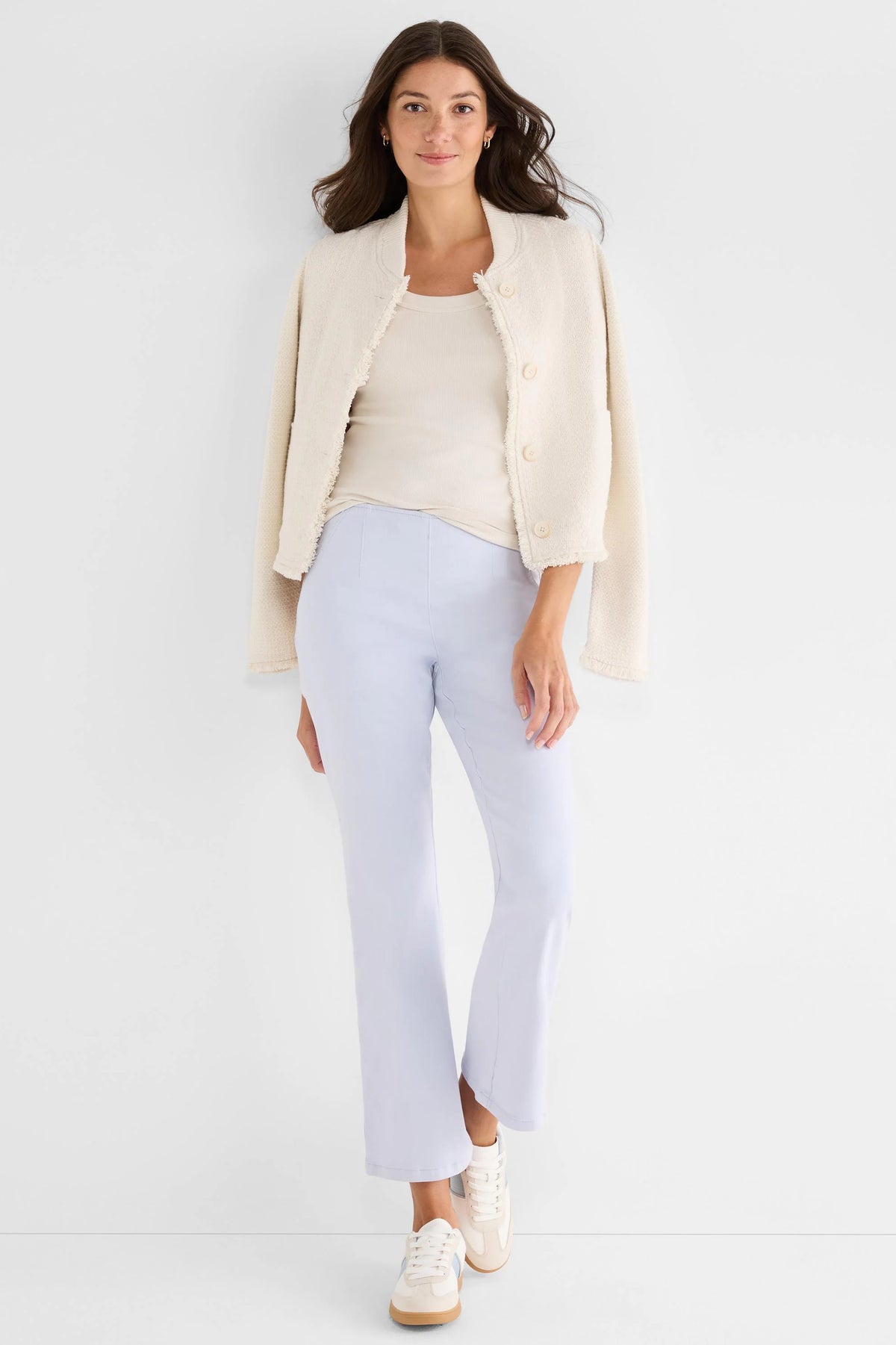 Pale blue bootcut jeans featuring distinct front seams and a subtle flare at the ankle.