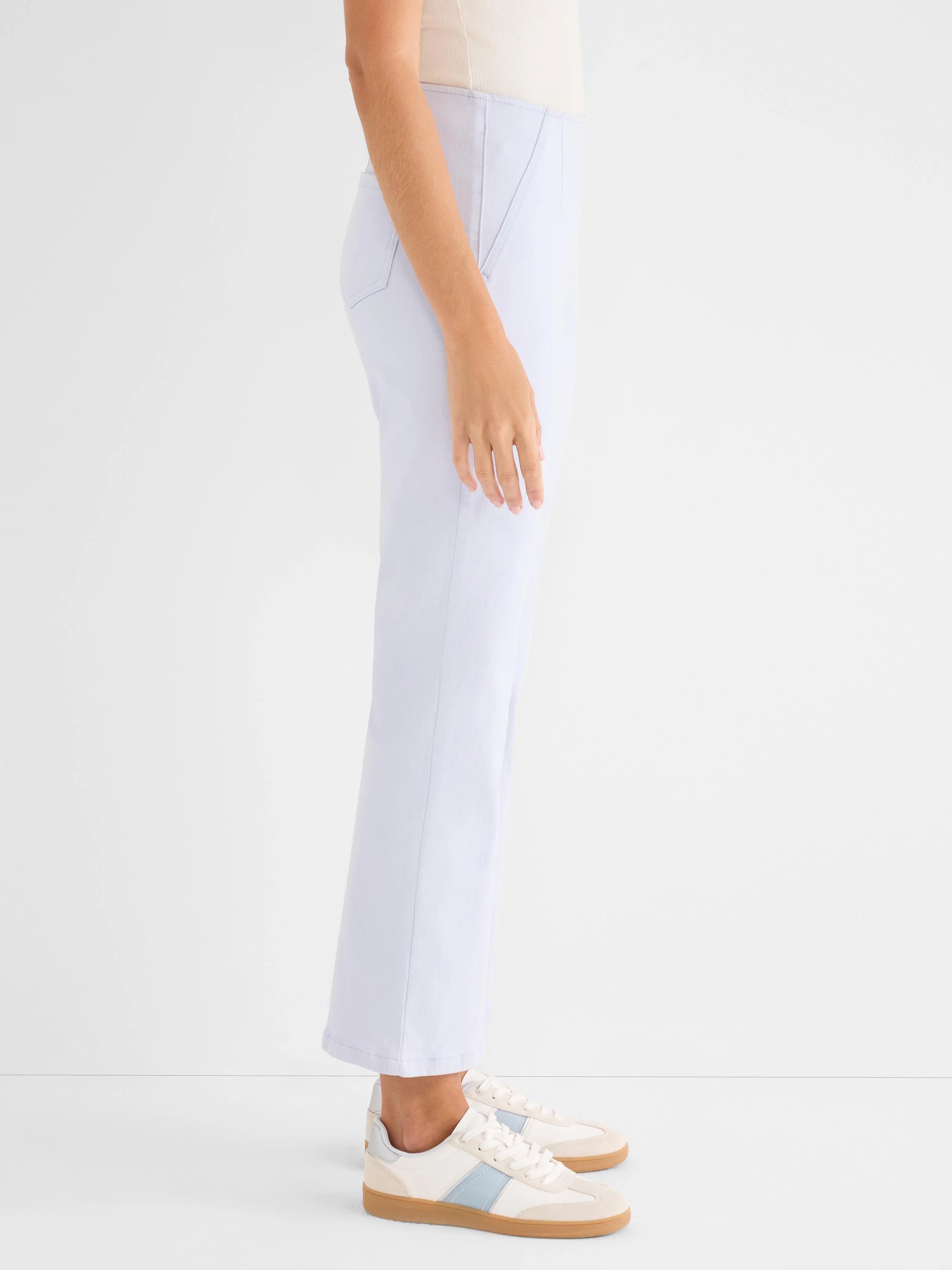 Pale blue boot-cut jeans. Ankle-length, with a smooth, clean front design.