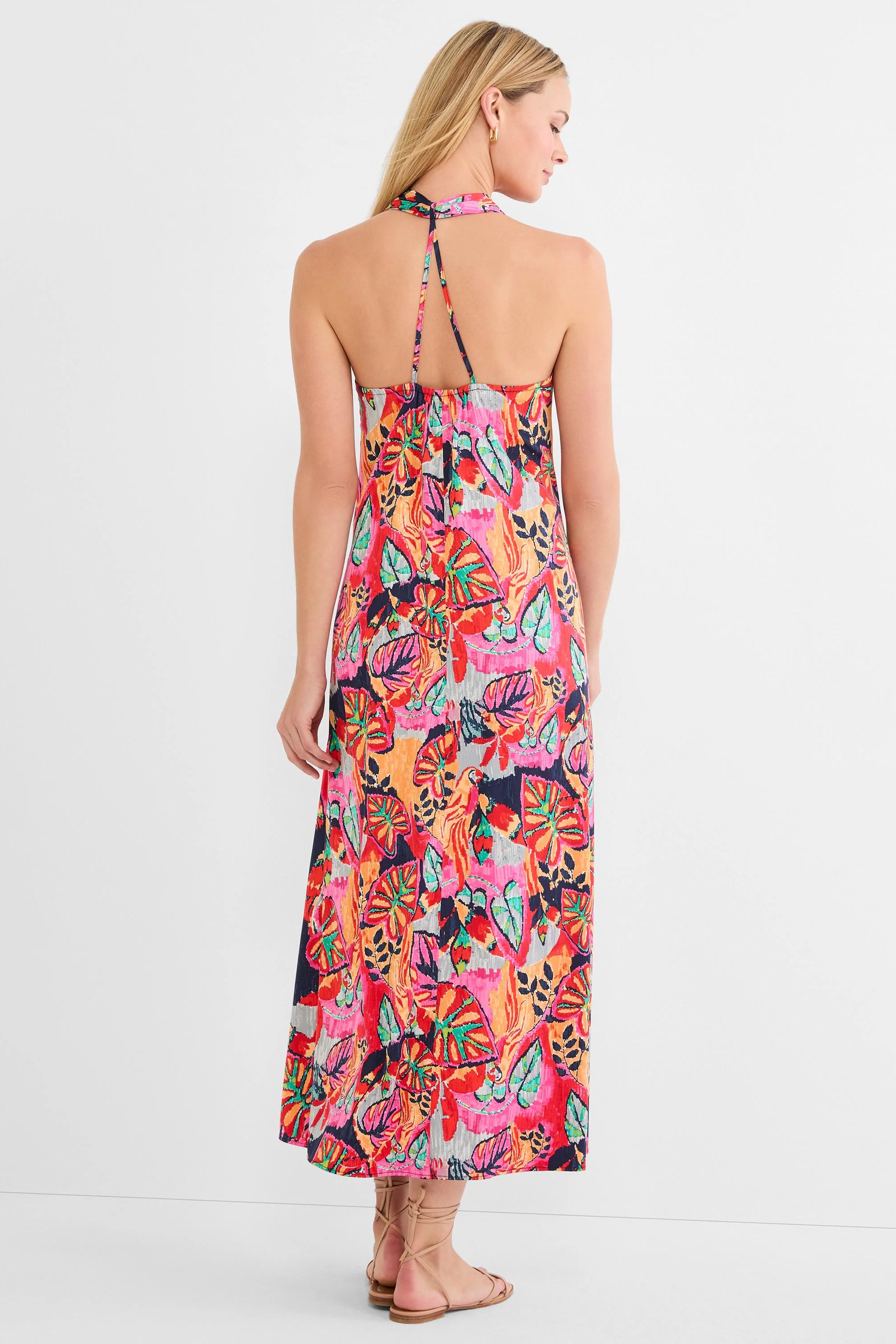 Vibrant tropical leaf print halter maxi dress: red, pink, orange, teal, navy, gray.